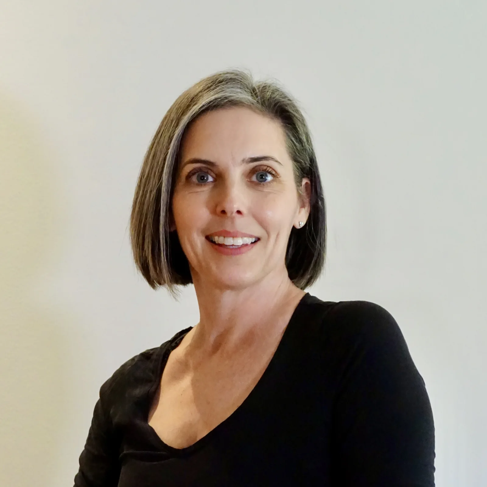 Joanne Decorte, Classical Pilates Teacher Trainer and Movement Educator, wearing black